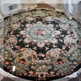 R103. Round handknotted Oriental rug. Approx. 8' w 